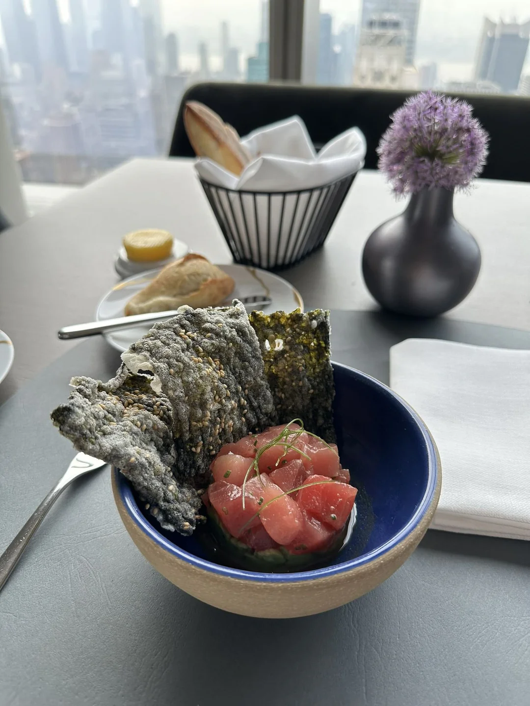 Marinated yellowfin tuna with avocado and nori chips