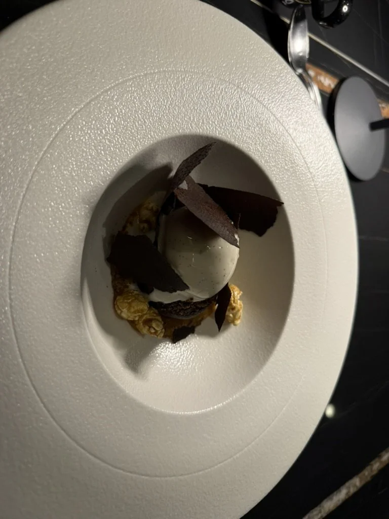 Chocolate dessert with vanilla ice cream and caramel popcorn