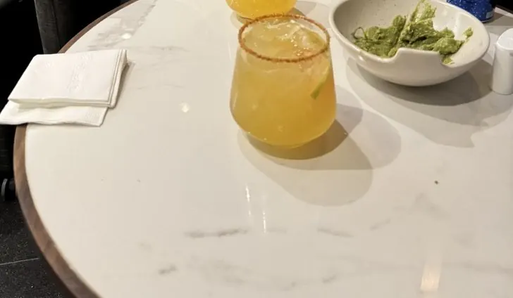 Margaritas with chili-salt rim and guacamole at the Centurion Lounge Terminal 1